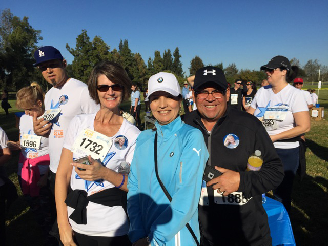 Credit Union staff with Pastor Joel Pagett at Colon Cancer 5K Walk/Run