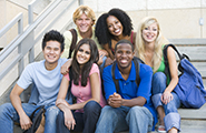 Group of university students sitting on steps