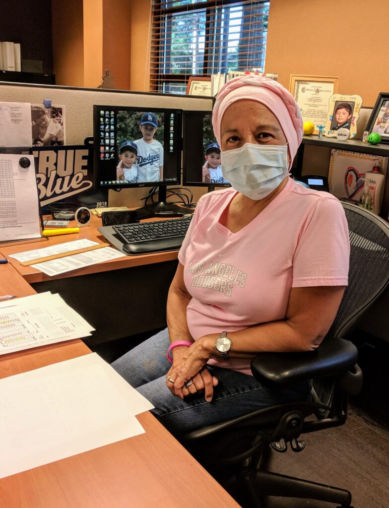 Cathy Martinez works while battling cancer