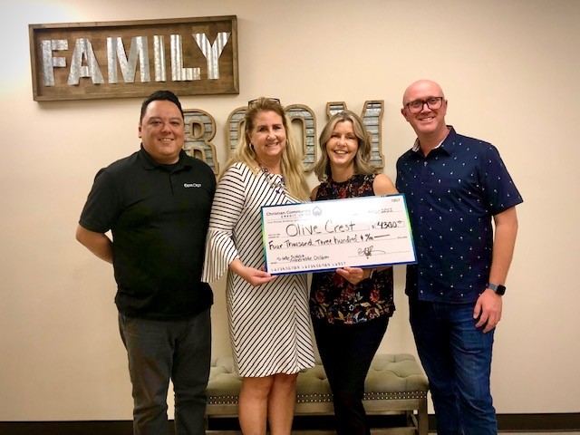 CCCU donation to Olive Crest