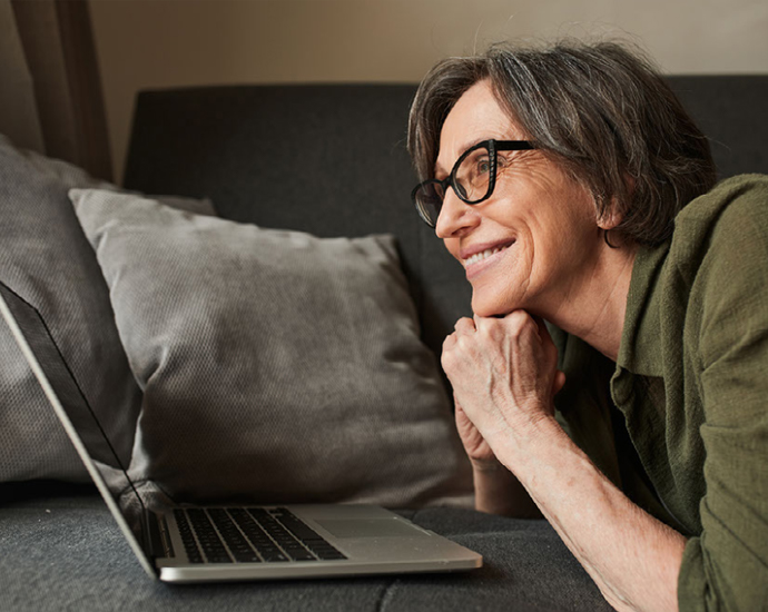 Mature Woman at Laptop