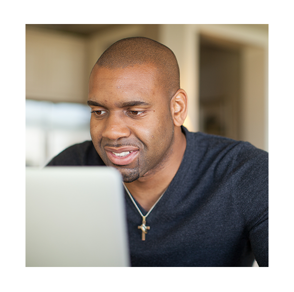 man looking at computer image