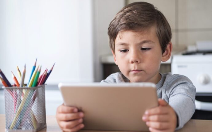 boy with a ipad