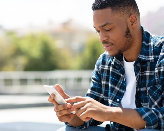 man-looking-at-phone