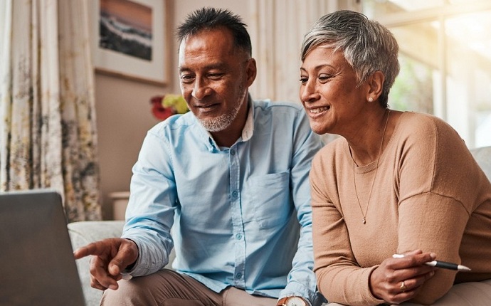 older couple looking at computer